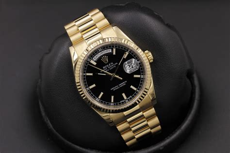 gold rolex day date black face|rolex day date 40mm price.